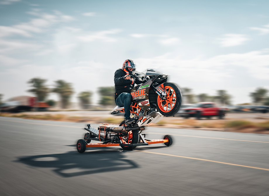 Wheelie and stunt training by Moto Zone in Dubai, showcasing advanced riding skills.